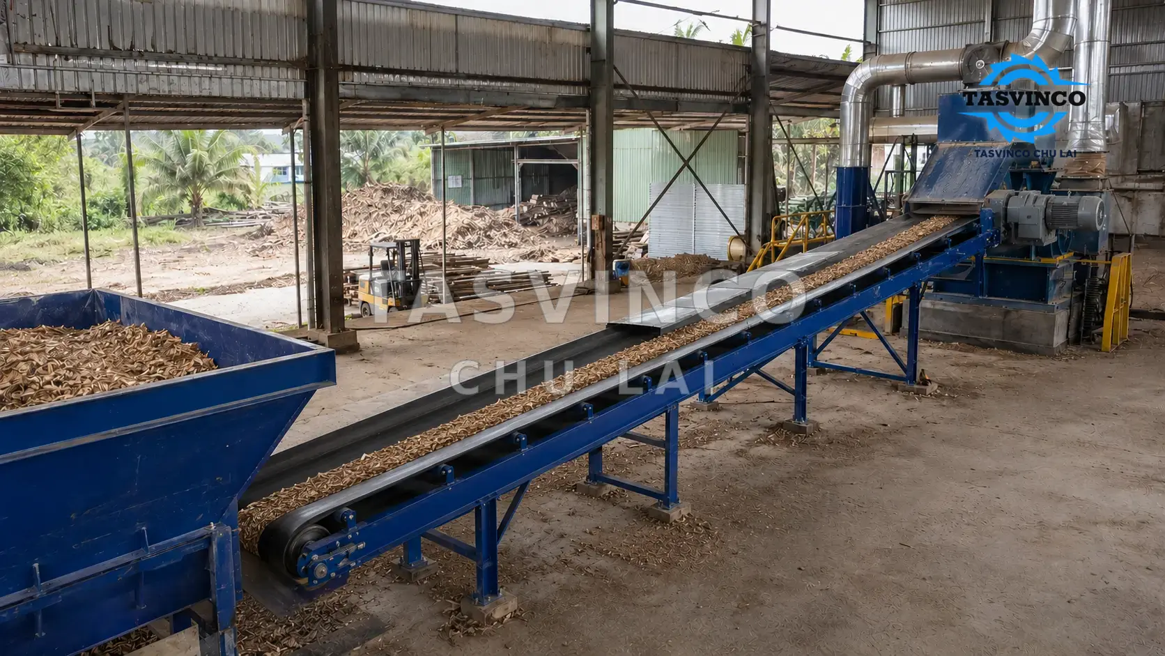 Băng tải lòng máng nhận và chuyển dăm gỗ trong nhà máy